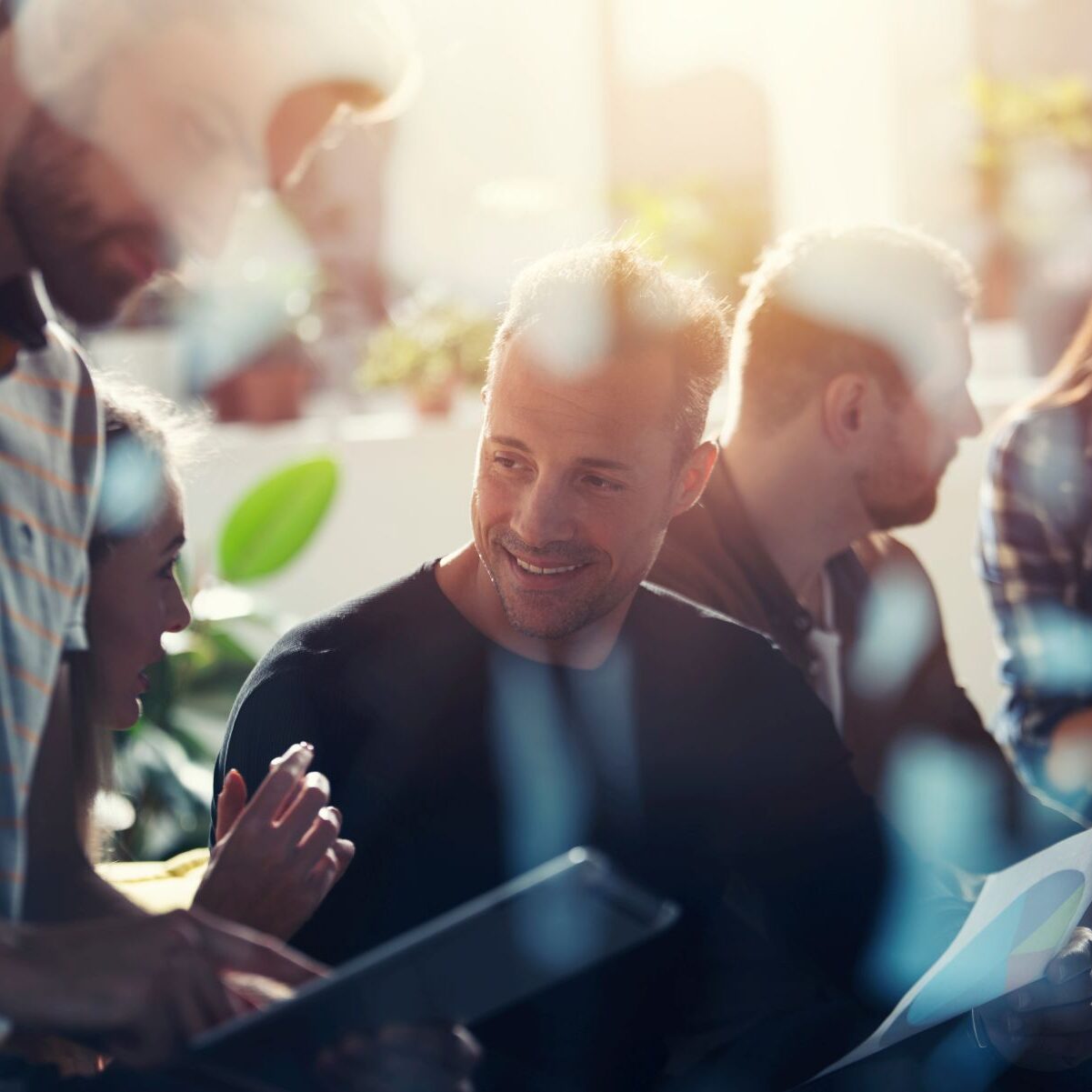 Business people connected on internet network with a tablet. concept of startup company. double exposure Business people in office connected on internet network with a tablet. concept of startup company. double exposure